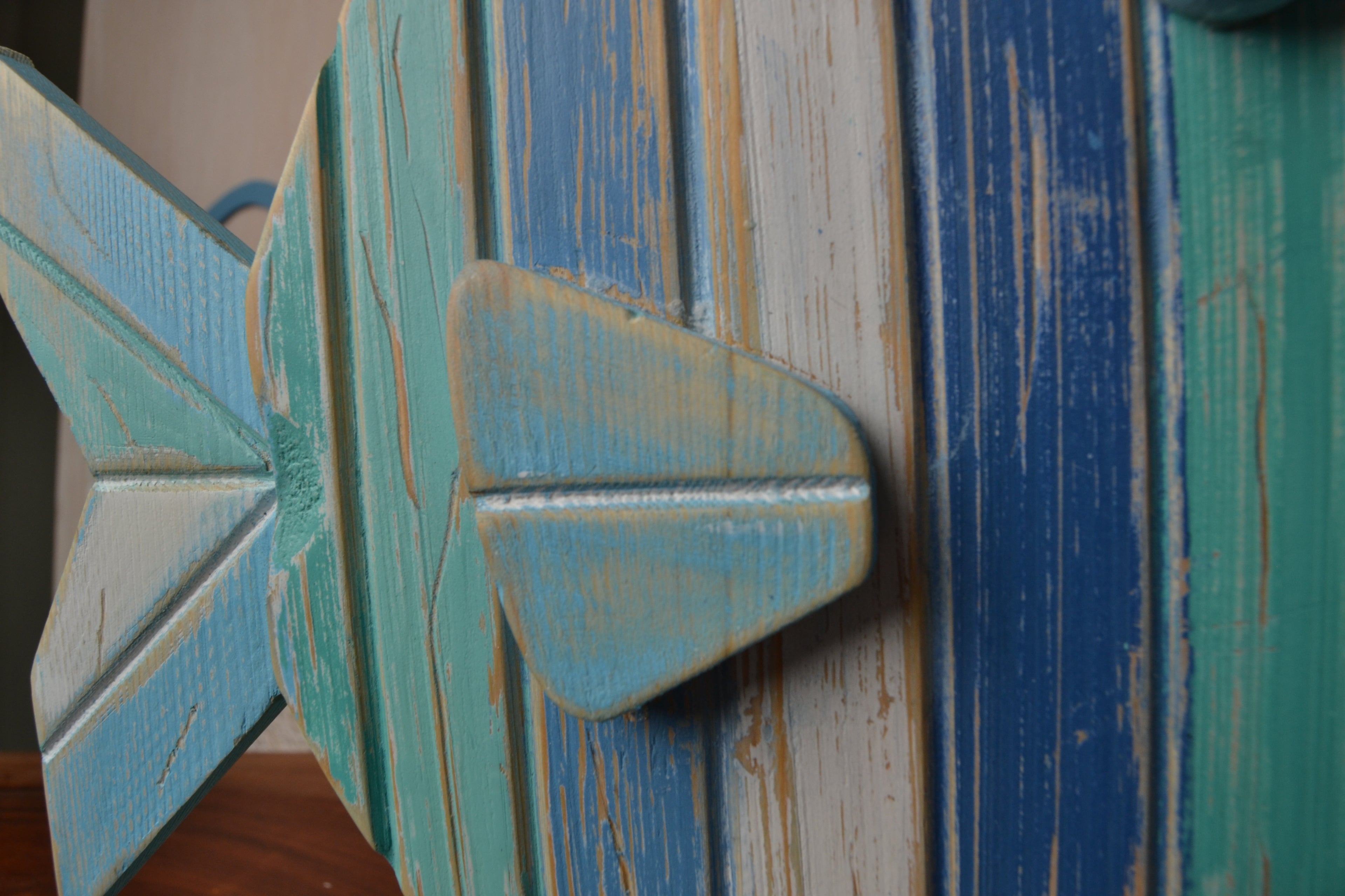Bahr Stripe Fish swimming in clear water, showcasing vibrant blue and black striped pattern on sleek, streamlined body.